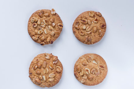 Cookies with nuts on a white background, Delicious cookies on a white backgroundの写真素材