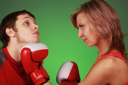 woman hiting man on face