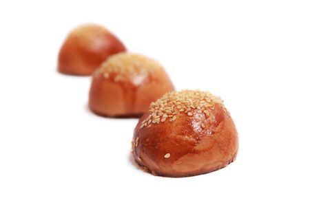 three crunchy loafs isolated on whiteの写真素材