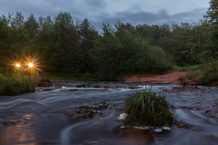 Karelian Isthmus, Leningrad, Russia, September 25, 2016 Jeep Wrangler on the lake, the Jeep Wrangler is a compact four wheel drive off road and sport utility vehicleのeditorial素材
