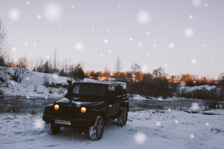 The river Tosno, Leningrad region, Russia - January 03, 2017 Jeep Wrangler unlimited off-road, Wrangler is a compact SUV produced by Chryslerのeditorial素材