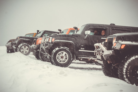 Karelian isthmus, Leningrad region, Russia - January 15, 2017. Jeep Wrangler unlimited on a forest road, the Wrangler is a compact SUV produced by Chryslerのeditorial素材