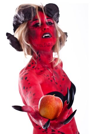 a devil woman with an apple