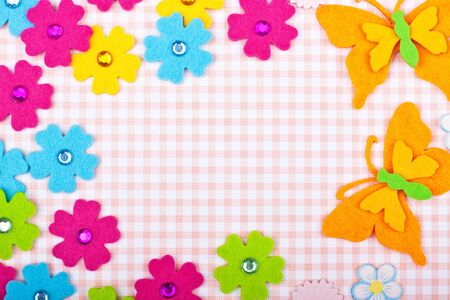 a greeting card with a lot of flowers and butterflyの写真素材