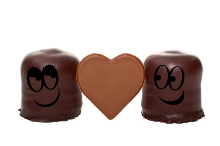 two romantic marshmallows showing their loveの写真素材