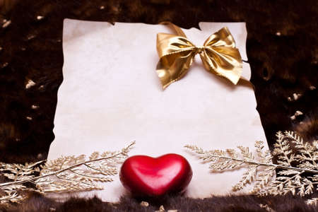 Festive invitation or congratulation in front of an art furの写真素材