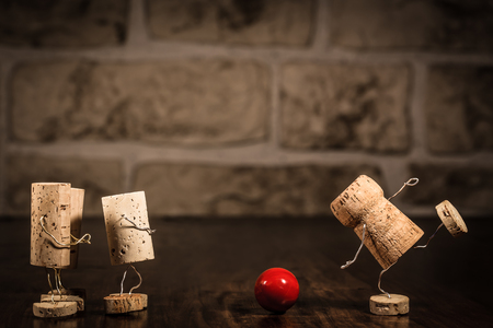 Concept going bowling with wine cork figuresの写真素材