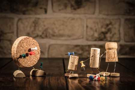 Concept gaming dart with wine cork figuresの写真素材