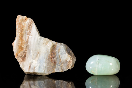 Andes, opal, uncut and Tumble finishing with black background and reflection