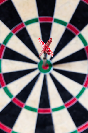 closeup of a Dartboard with Steeldarts in bullseyeの写真素材