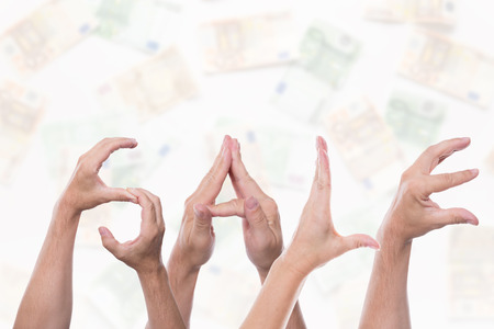 The word sale in front of a lot Eurosの写真素材