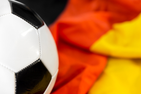 soccer ball or football on a german flag, sport backgroundの写真素材