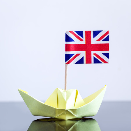 paper ship with british flag, concept shipment or free trade agreementの写真素材