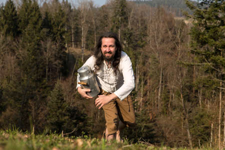 a rustically farmer with churn come running upの写真素材