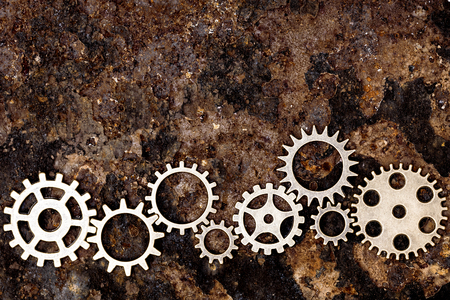 lots of gears on rusty background, concept gearing and mechanicalの写真素材
