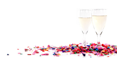 Header with confetti and champagne glasses in front of whiteの写真素材