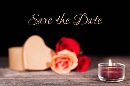 Save the date background with roses and heart boxの写真素材