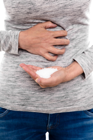 woman with sulfite allergy is having painful cramps