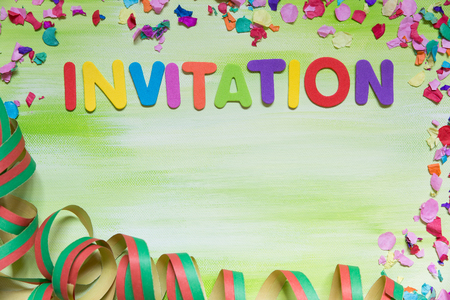 colorful letters and confetti, word invitation, copyspaceの写真素材