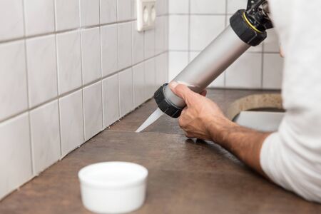 Joint between two worktops is sealed with siliconeの写真素材