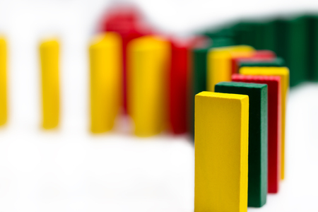 colorful dominos on white background coming together, concept connection or global networking,...