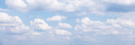 panorama with blue sky and white cumulus cloudsの写真素材