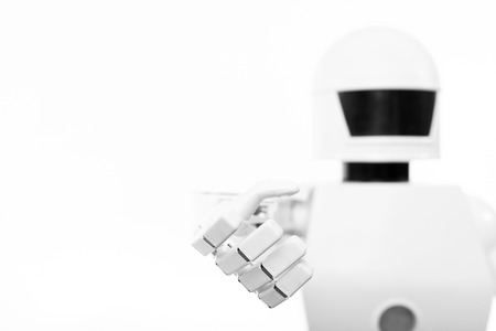 closeup of an cute autonomous service robot, isolated in front of a white backgroundの写真素材