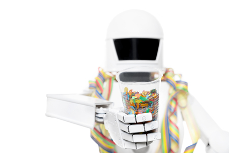 cute robot with carnival party decoration, isolated in front of white background, concept celebration in the futureの写真素材