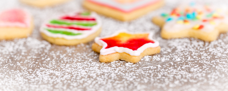 Banner, colorful cookies with frosting on icing sugar, concept selfmade bakeryの写真素材