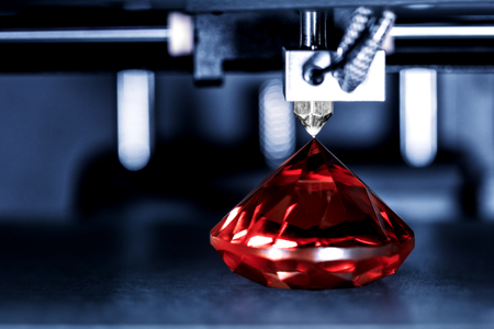 3D printer prints a gem, Ruby with transparent filament or other glassy plastic