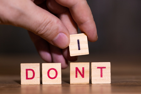 Hand exchanges the letter N in the word dont for an I, do it