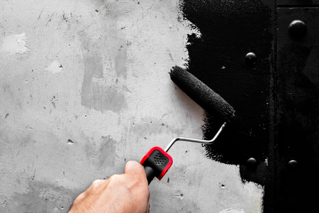 Raw wall is redesigned in industrial look or industry look, black paint as a primer