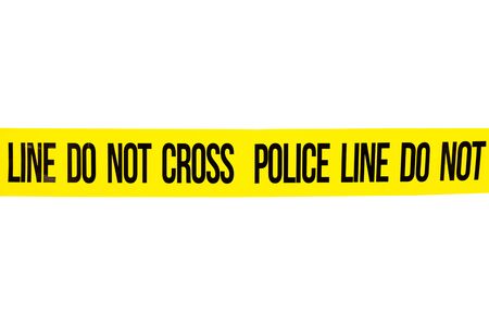 Police line do not cross tape isolated on white background, inforcement and investigation conceptの写真素材