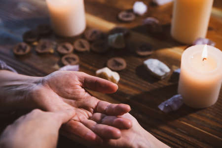 chiromancy and palm reading with a fortuneteller, oracle and horoscope, spirituality