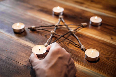 Preparation of an pentacle or pentagram, occultism and mystical ritual, closeup