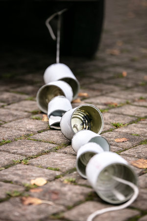 Car with tied cans, concept wedding tradition, vertical shotの写真素材