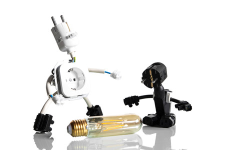 funny miniature craftsman, built from tools and materials, concept electrician and technology