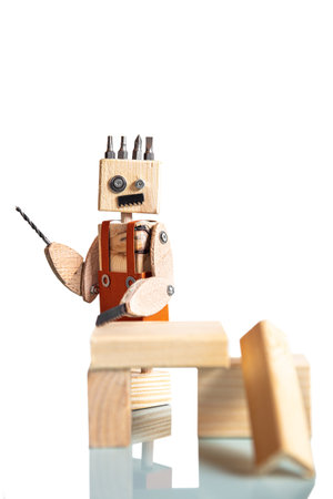 funny miniature craftsman, built from tools and materials, concept carpenter or diy or home craftsmanの写真素材