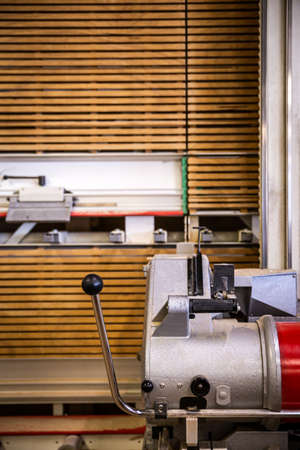 a vertical panel saw in a carpenter's shop or a hardware store, a vertical circular saw in a workshopの写真素材