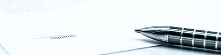 banner or header, business concept picture with papers and documents, a pen and place to signの写真素材