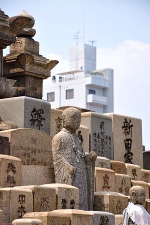 Tombstone and buildings are strangely mixed in Osakaのeditorial素材