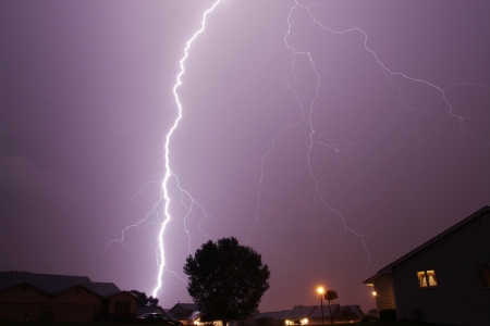 lightning across sky thunderstormの写真素材