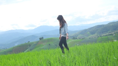 A girl in the rice fieldsの素材