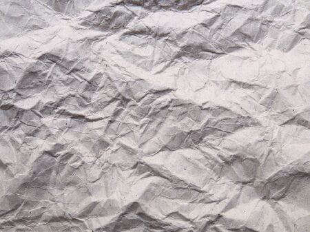 Brown creased paper background textureの写真素材