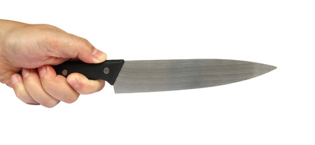 Knife in a hand isolated on white backgroundの写真素材