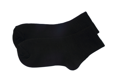 Black socks isolated on white background.の写真素材