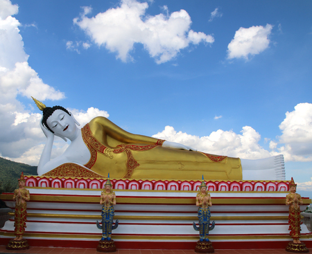 Statue of big Buddha in the temple Wat Doi Kham, Chiang Mai, Thailandの写真素材