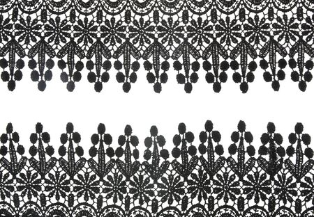 Black lace band isolated on white background.の写真素材