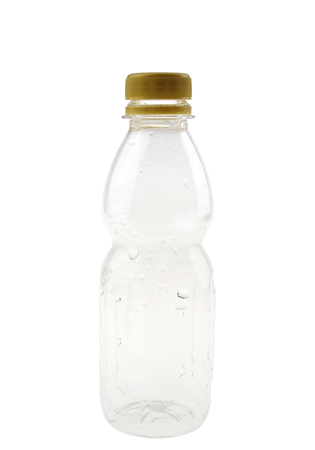 Empty plastic bottle with droplet isolated on white background.の写真素材