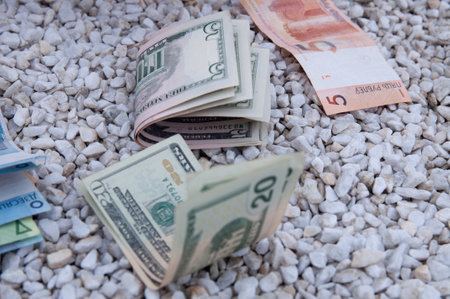 Money, USA dollar banknote and belarusian rubles background on white stones